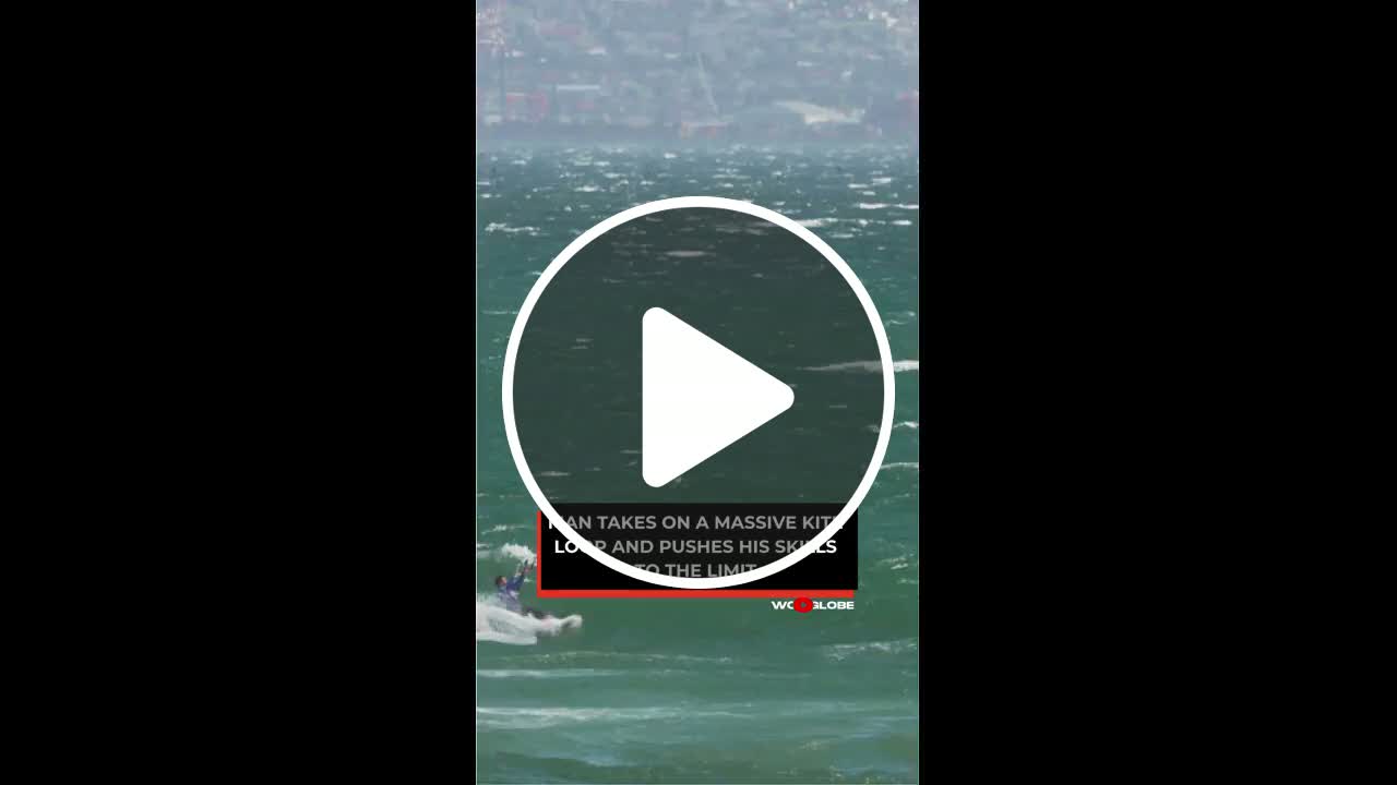 Daredevil Kite-Surfer Executes Stunning Loop at Major Event