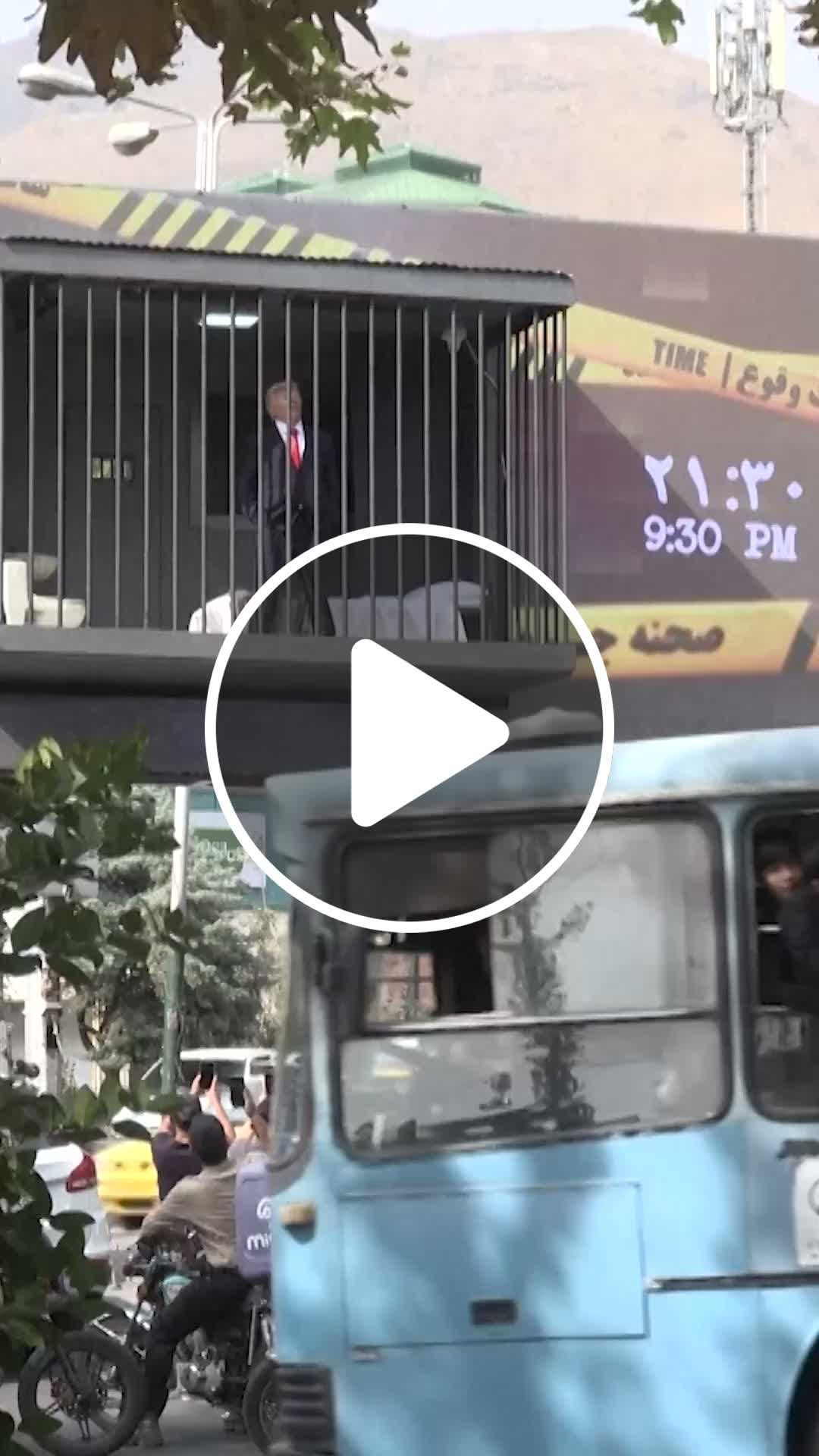 Art installation in Iran features performer dressed as Trump - NewsBreak