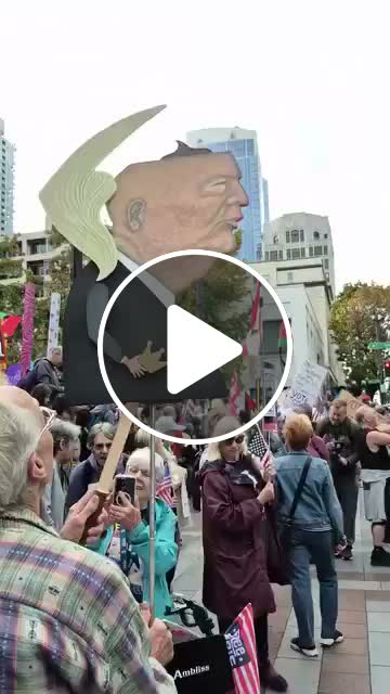 US citizens at a rally against Trump. - NewsBreak