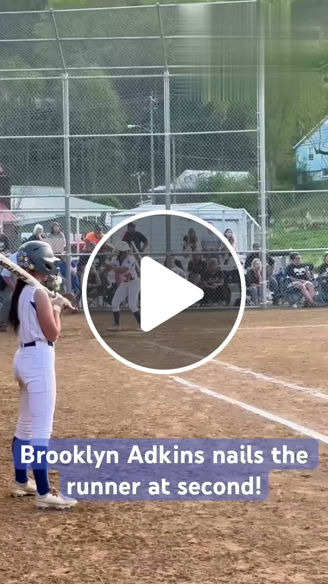 Greenbrier West catcher Brooklyn Adkins eliminates a runner at second ...