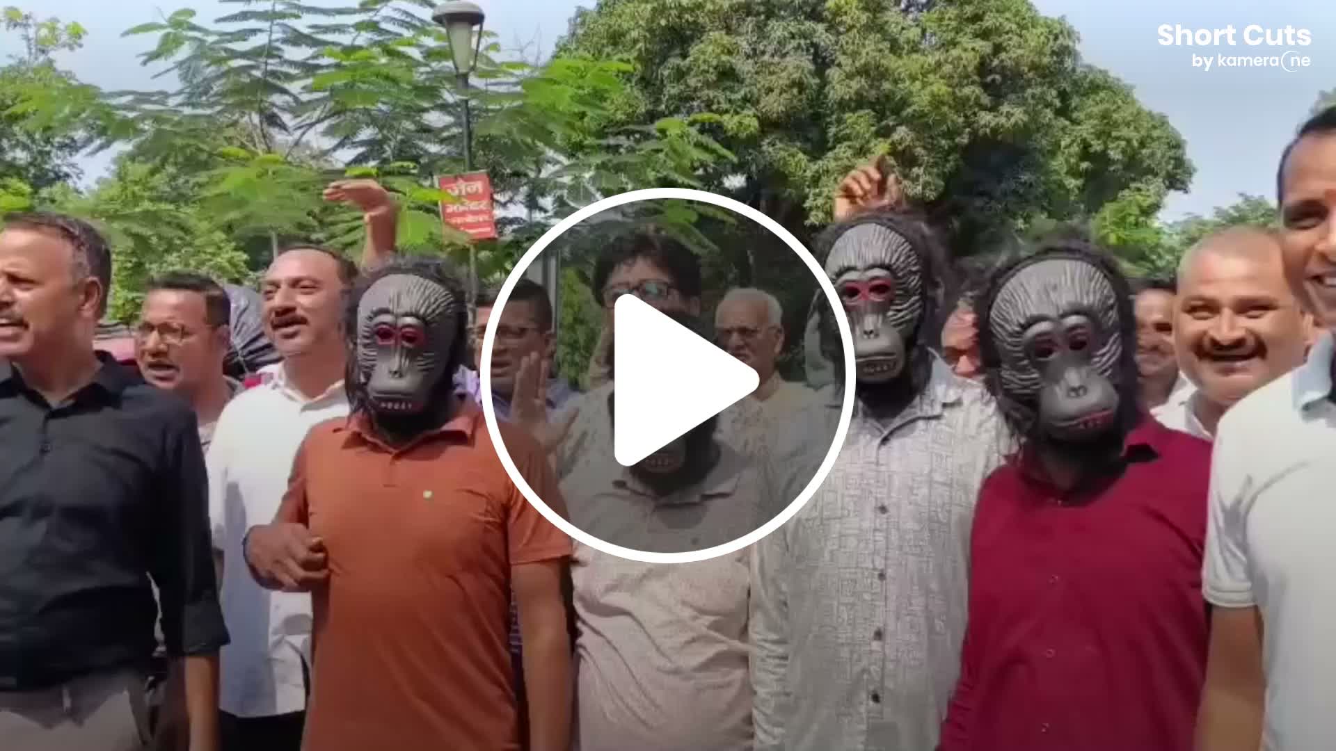 Residents wear monkey masks to protest against repeated monkey attacks ...